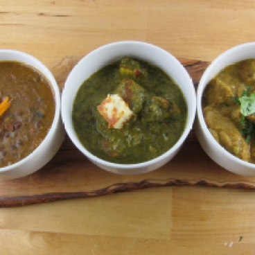 dal makhini, saag paneer, and coconut almond chicken curry